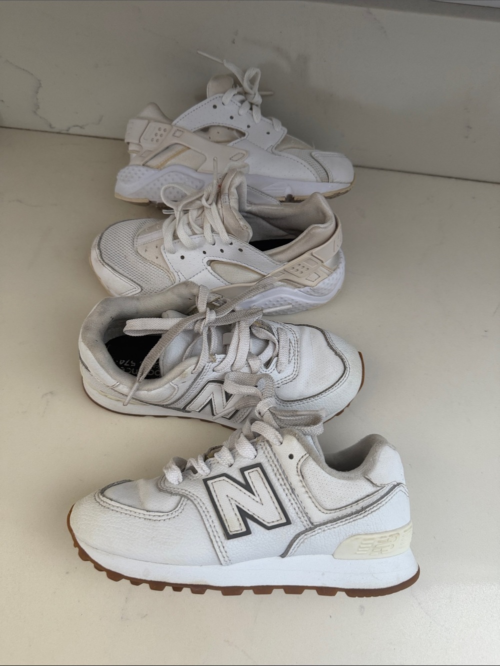 Nike and new balance Size 12 kids shoes